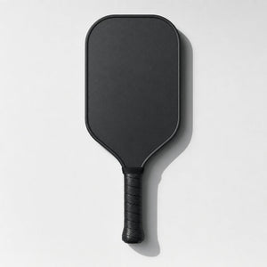 Black carbon pickleball paddle seen from the front
