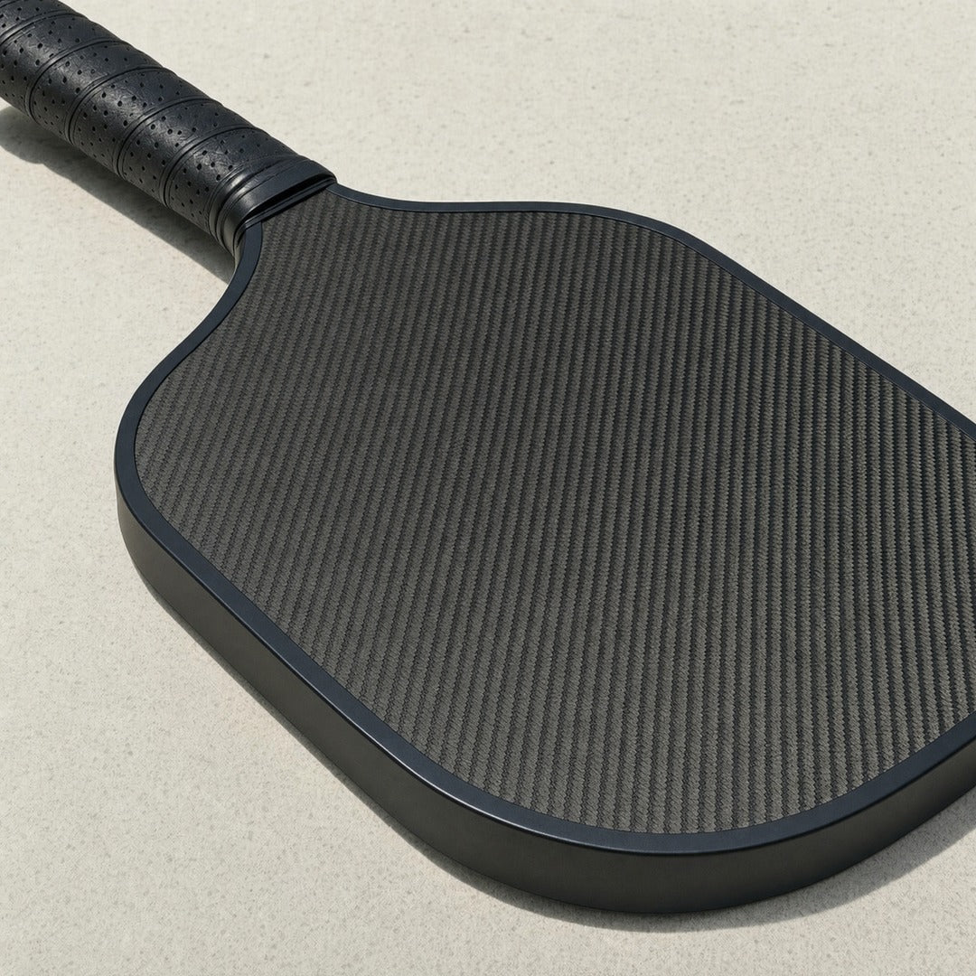 Dinkwell Carbon Paddle - raw carbon face and sealed edge
